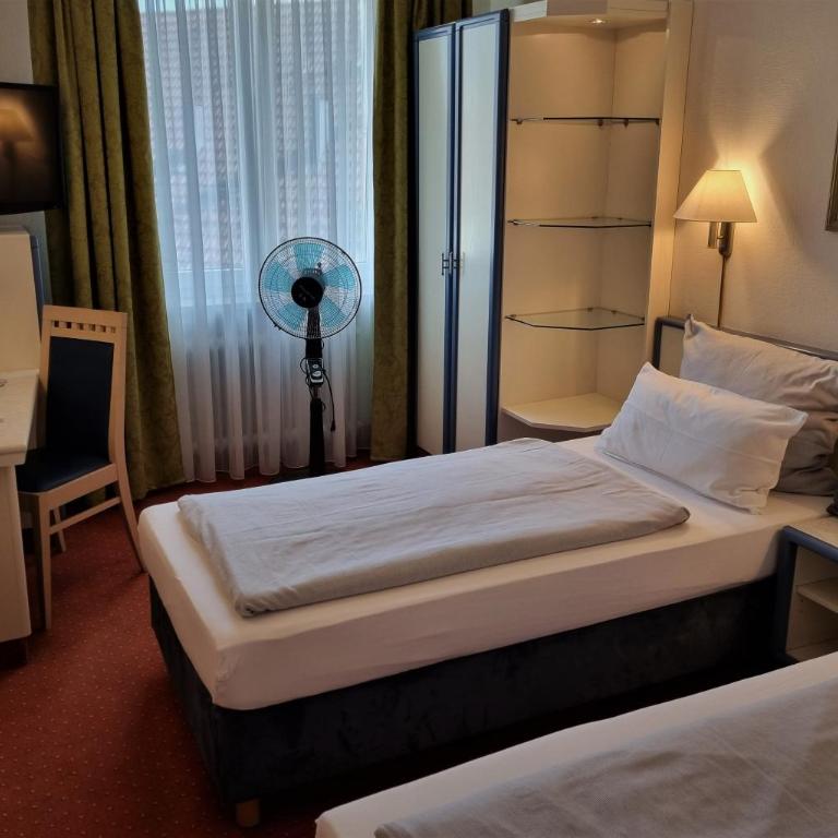 myMINGA4 - Hotel & serviced Apartments - Großes Zweibettzimmer - 2