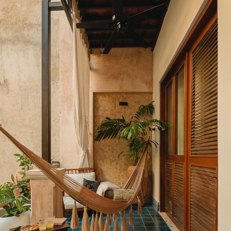 CIGNO HOTEL BOUTIQUE- Adults Only - Suite con patio y vistas a la piscina - 1 cama extragrande - 13