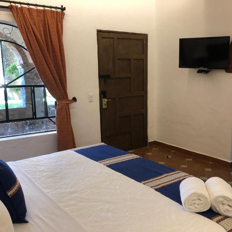 Hotel Hacienda Monteverde San Miguel de Allende - Habitación con cama extragrande. - 1