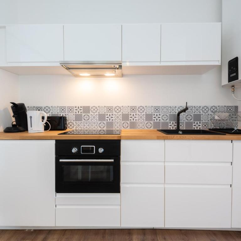 Appartements centre-ville - Wifi - Cuisine tout équipée - Lave-linge - Appartement 1 Chambre - 18
