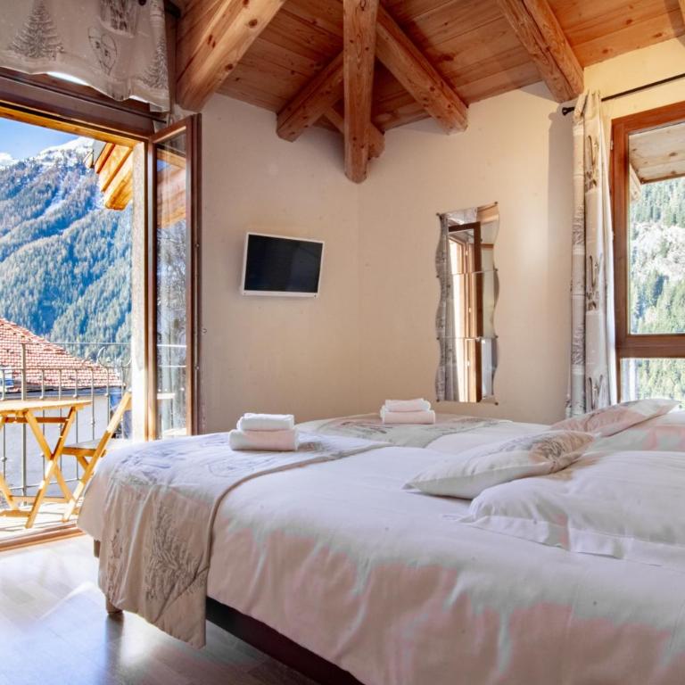Chalet Hotel La Tarine - Chambre Quadruple - 11