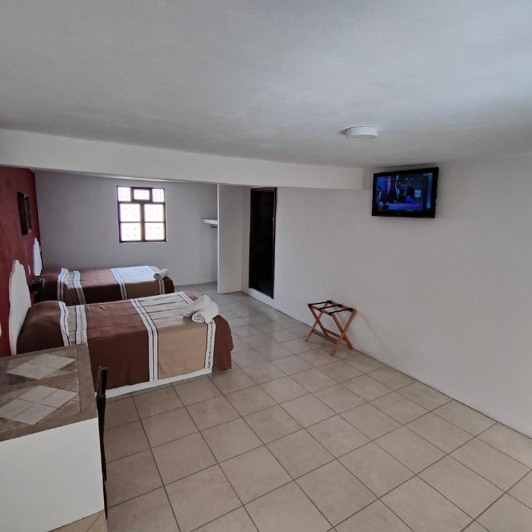 Hotel Hacienda Morales. - Superior Quadruple Room - 8