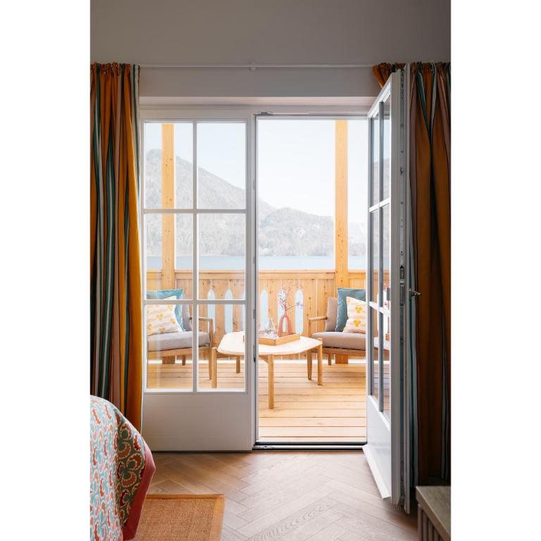 Villa Alma - a lakeside Boutique Hotel - Studio mit Seeblick - 1