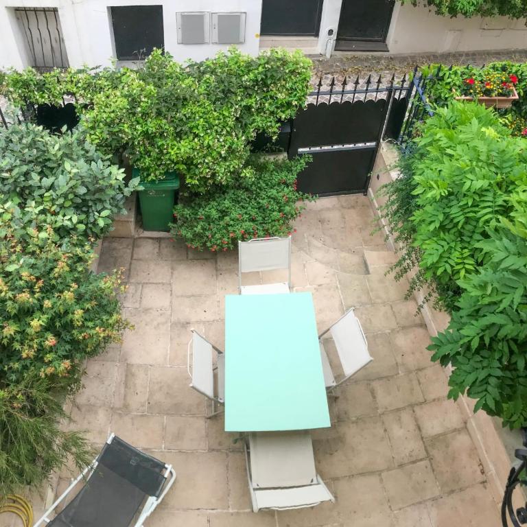 Charming townhouse with garden in the City of Love - Maison de Vacances - 17