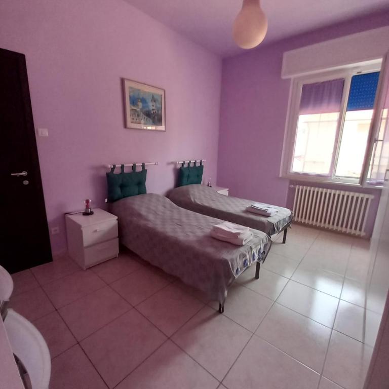 Affittacamere Appartamento colorato - Camera Queen con Bagno in Comune - 21