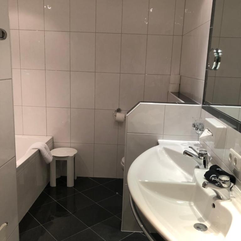 Hotel Garni Central - Zimmer - Studios - Apartments - Apartment mit 1 Schlafzimmer - 5