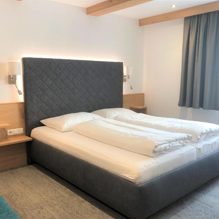 Hotel Garni Central - Zimmer - Studios - Apartments - Superior Familienzimmer - 1