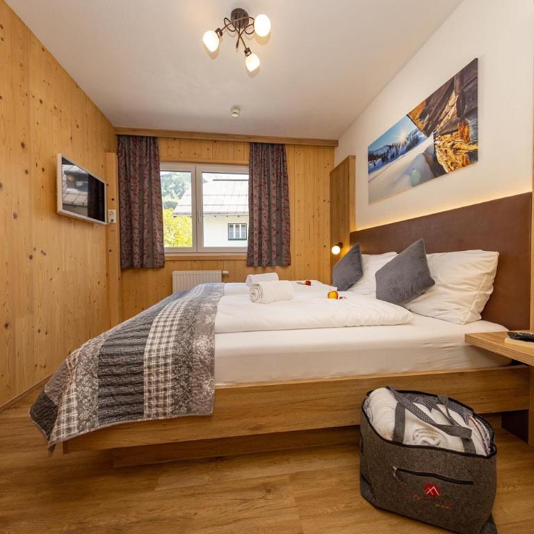 Wellness- und Familienhotel Garni Dachsteinresort - Apartment mit 3 Schlafzimmern - 5