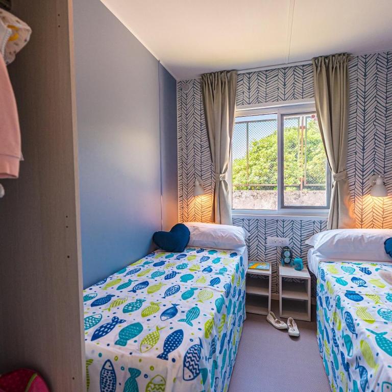 Village & Glamping Riva Blu - Mobilheim mit Seeblick - 8