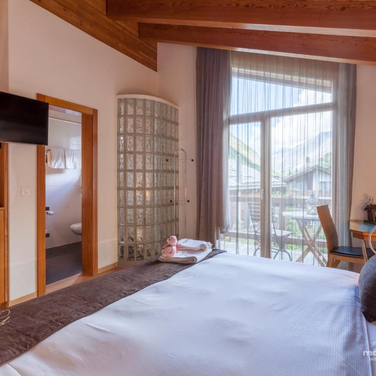 Suitenhotel Zurbriggen - Suite mit 3 Schlafzimmern - 9