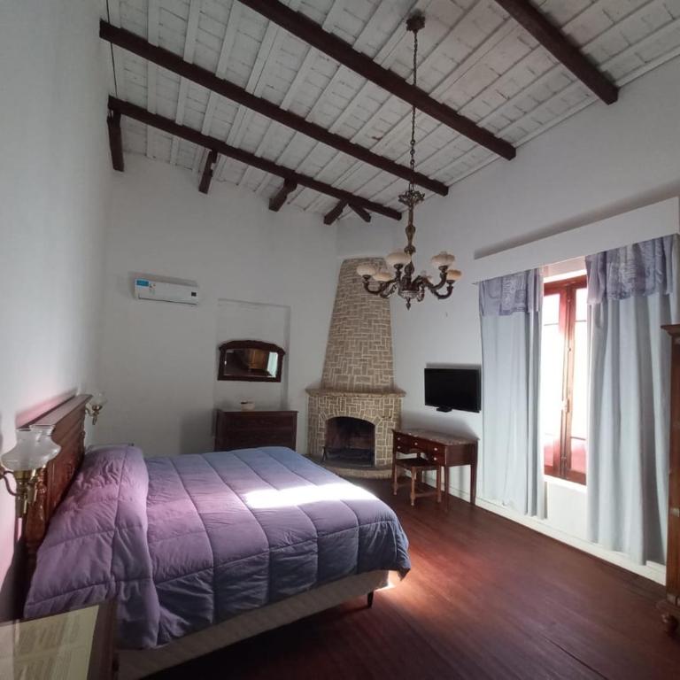 Posada Nocenta Pisetta - Habitación con cama extragrande. - 8