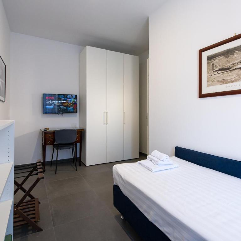 Clover - 13 Piazza Pio XI - Appartamento con 2 Camere da Letto - 31