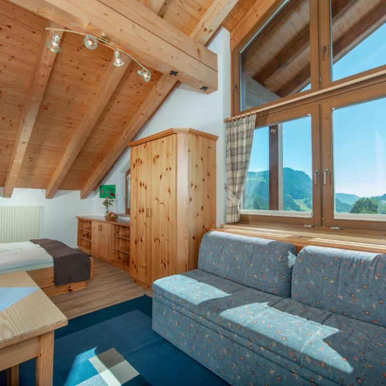 Familienhotel Unterreith - Familienzimmer mit Bergblick - 1