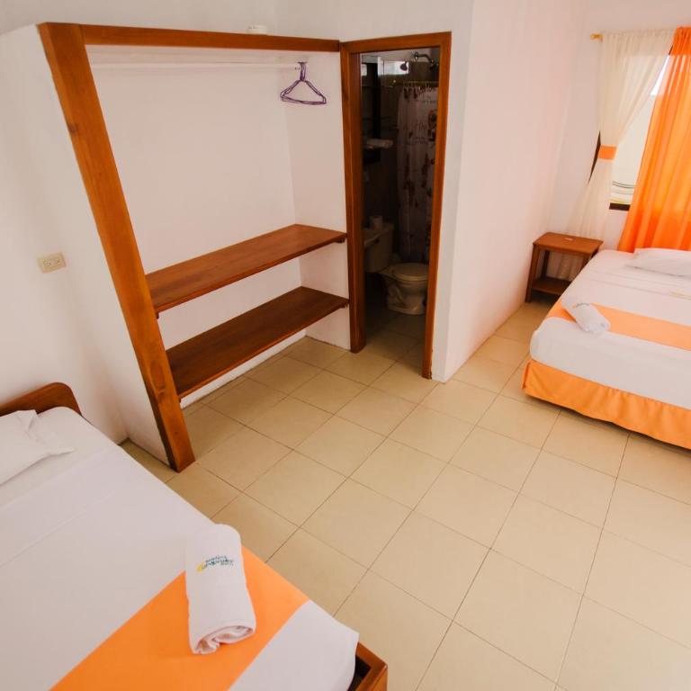 Hostal Sueños Silvestres - Double Room with Two Double Beds - 1