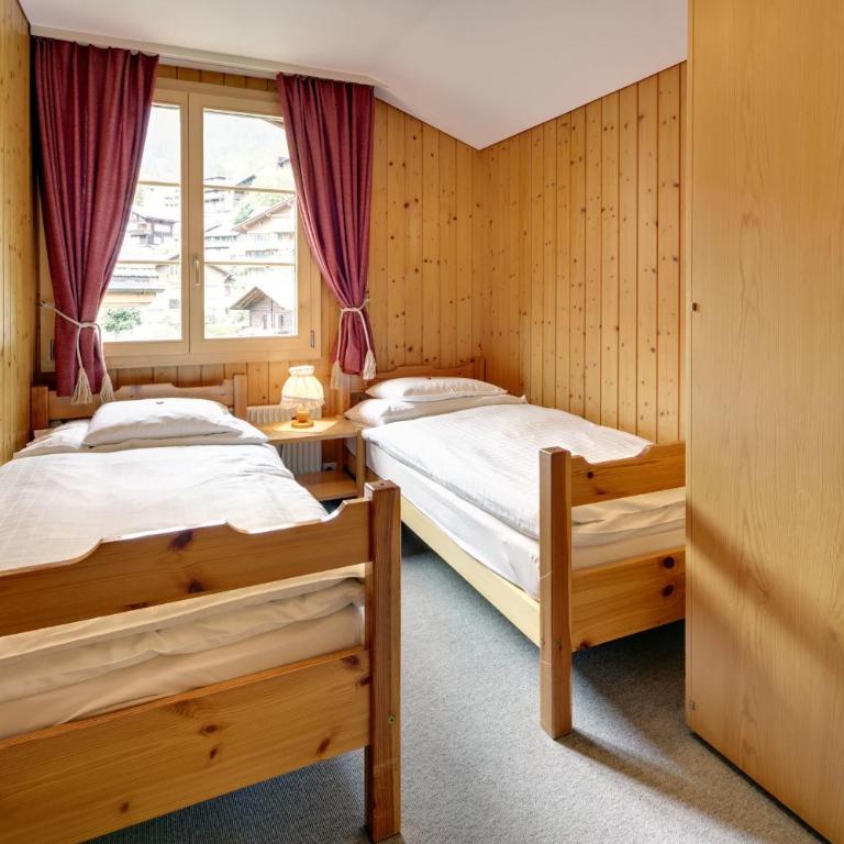 Hotel Alpenrose Wengen - a family affair since 1881 - Apartment für 4 Personen mit Bergblick - 4