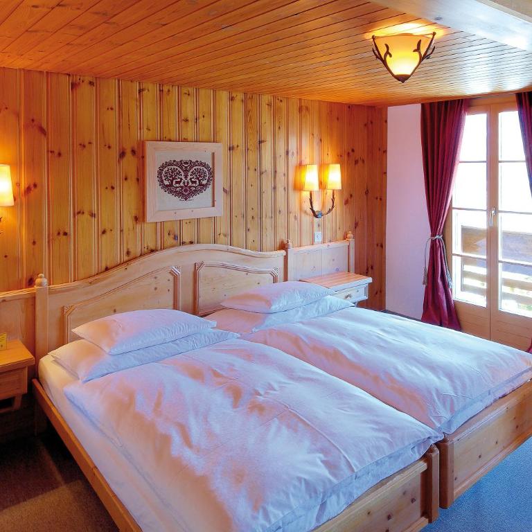 Hotel Alpenrose Wengen - a family affair since 1881 - Superior Doppelzimmer mit Balkon und Bergblick - 4