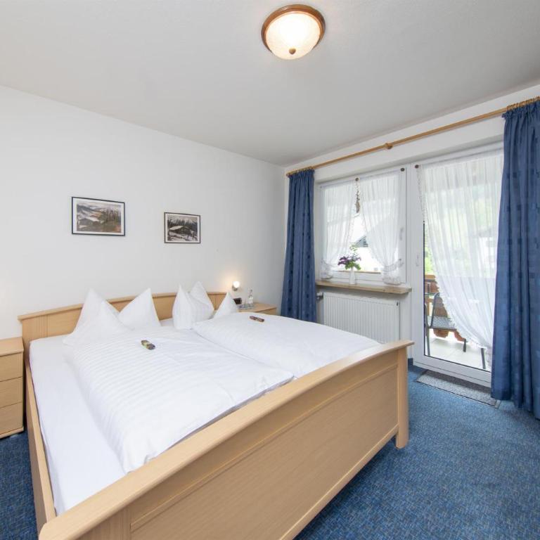 Landhaus Goldener Apfel - Doppelzimmer mit Gartenblick - 11