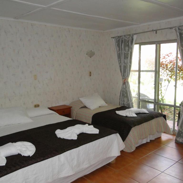 Tupa Hotel - Habitación Cuádruple - vistas al jardín - 4