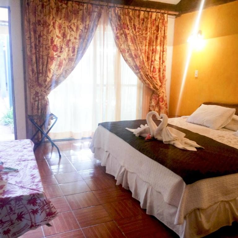 Tupa Hotel - Habitación Cuádruple - vistas al jardín - 2