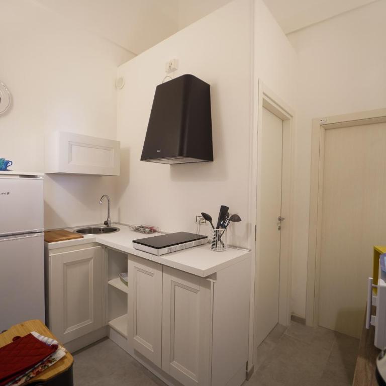 Ailanthus Holiday Suites - Camera Matrimoniale Deluxe (2 Adulti + 1 Bambino) - 11