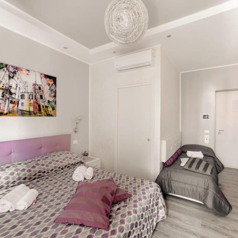 Smart Holidays - Camera Tripla con Balcone - 4
