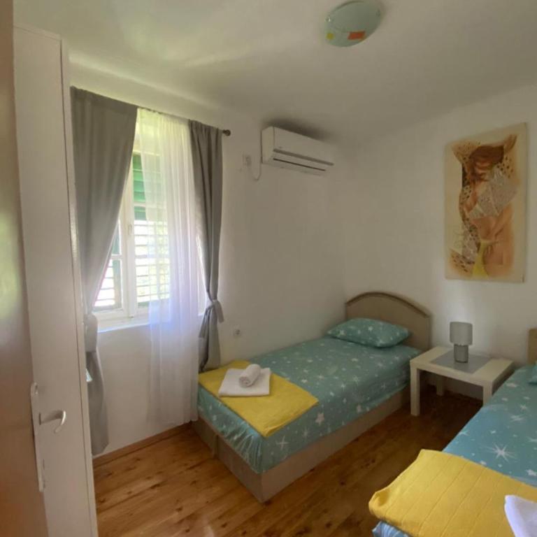 Apartments Vido - Two-Bedroom Apartment with Terrace and Sea View - 4