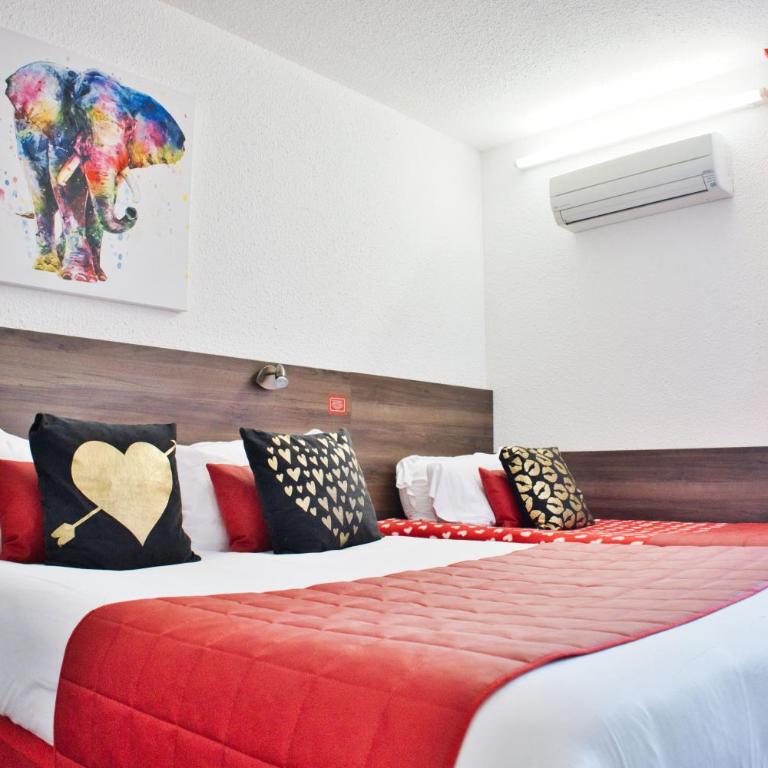 Cit'Hotel des 2 Golfs - Chambre Triple avec Vue sur Village - 2