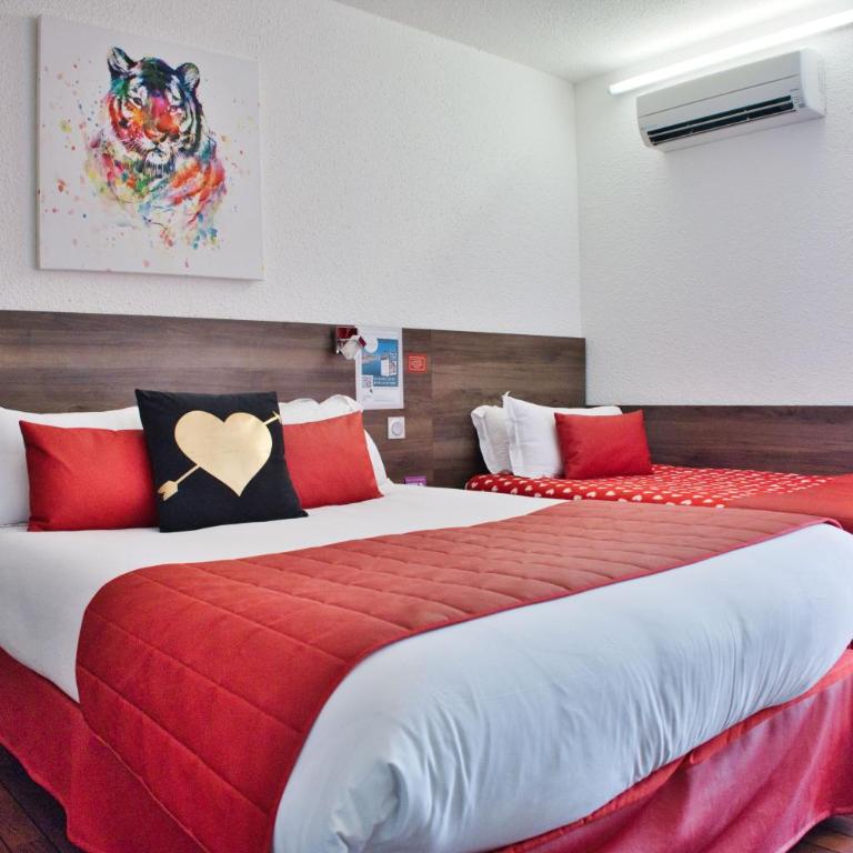 Cit'Hotel des 2 Golfs - Chambre Triple avec Vue sur Village - 5