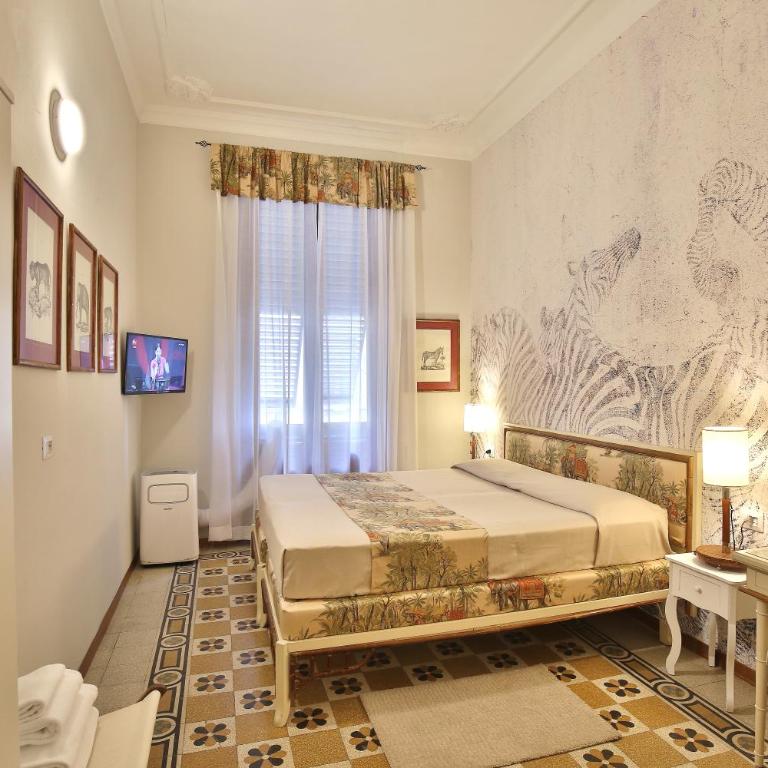 MADAMA GUEST HOUSE - Camera Matrimoniale con Bagno Privato Esterno - 1