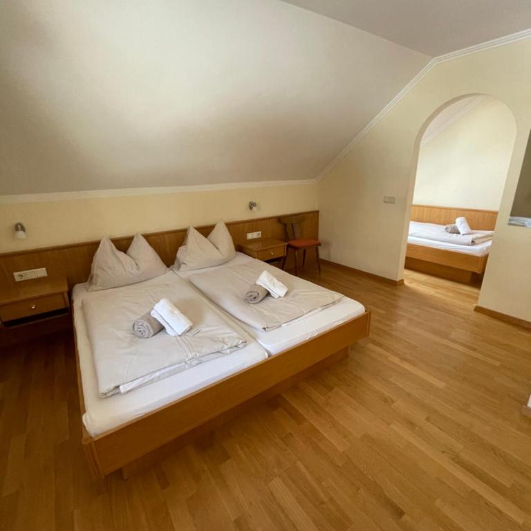 Landhaus Metzgerstubn - Dreibettzimmer - 1