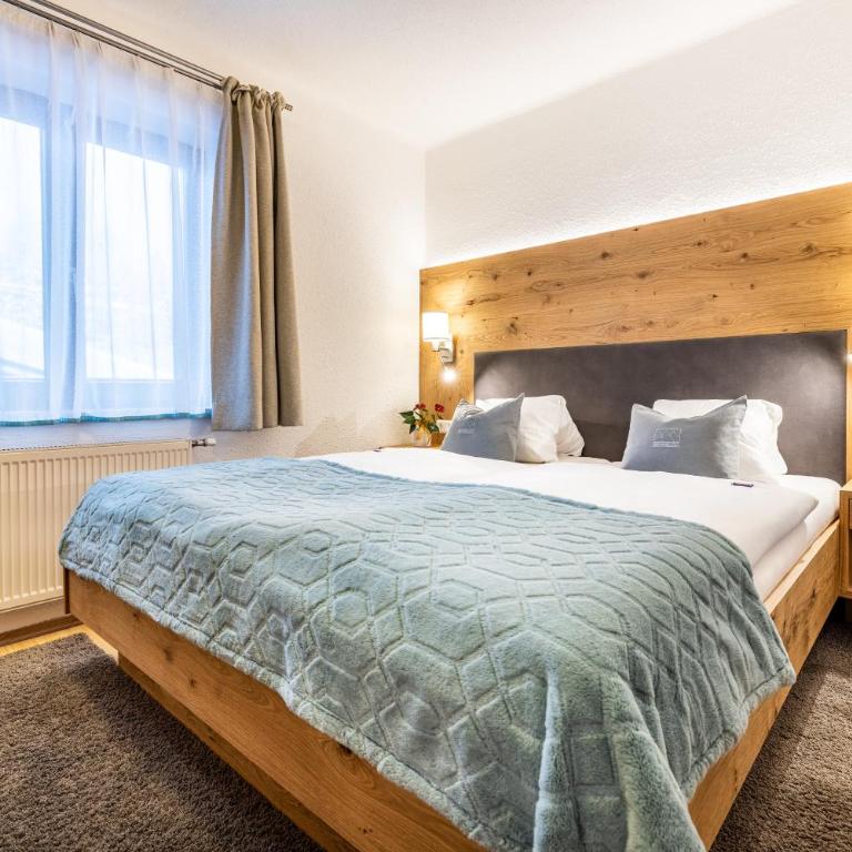 Sportpension Bergblick - Apartment mit 4 Schlafzimmern und einem Balkon - 22