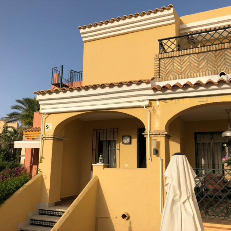 Adosado primera linea de playa en Jardines de Zahara - Three-Bedroom Home - 1