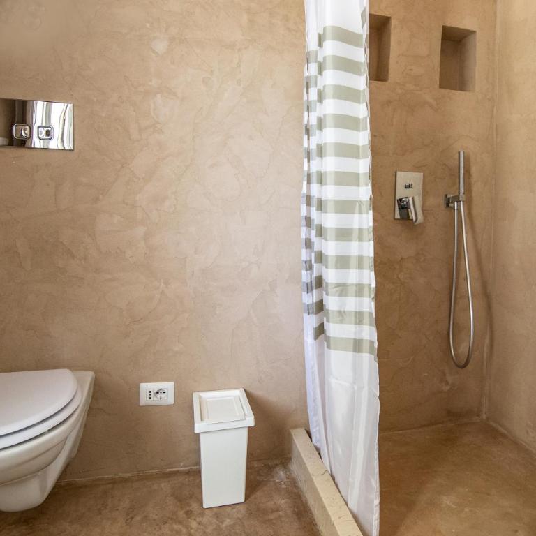 TRULLI MELOGINO with private beach volley camp - Three-Bedroom Villa - 23