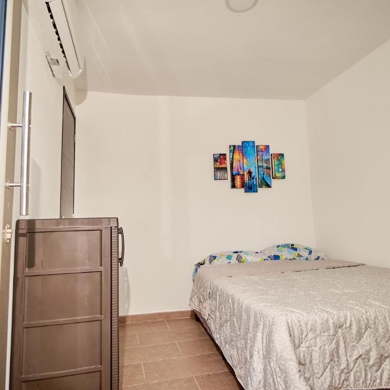 Passarela Hospedaje - Habitación Deluxe - 1 cama grande - 5