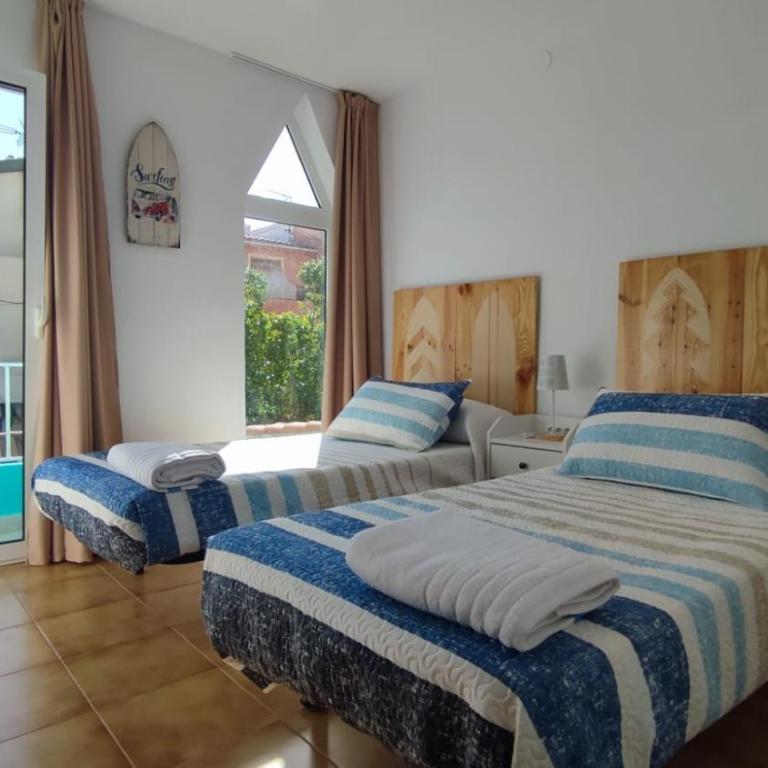 Agradable adosado cerca de la playa - Three-Bedroom House - 10