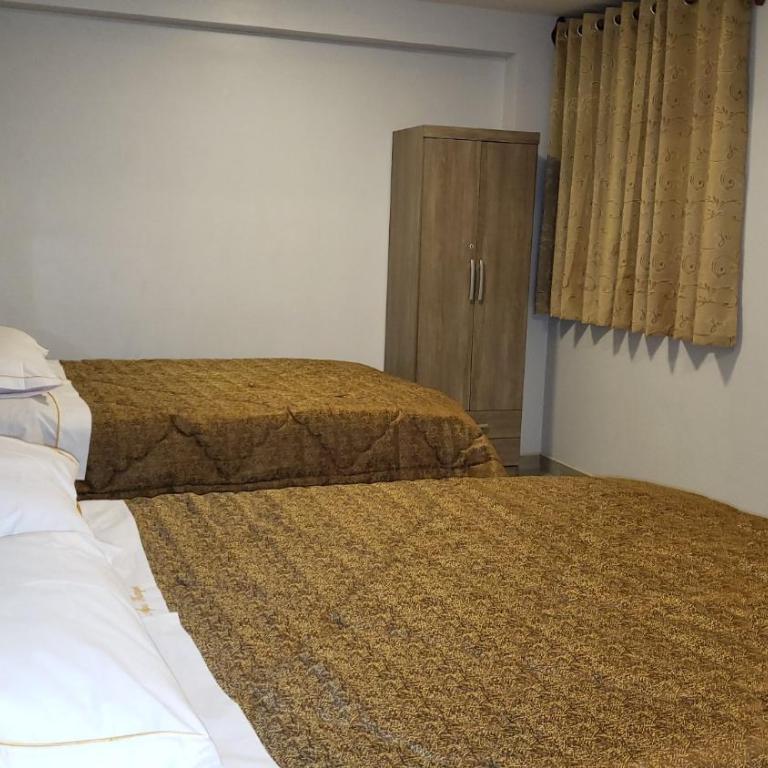 Hotel Apu Kempor - Standard Double Room with Two Double Beds - 1