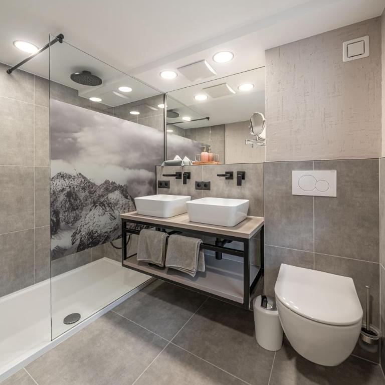 Genusshotel Alpenblick - Deluxe Doppelzimmer mit Zustellbett - 2