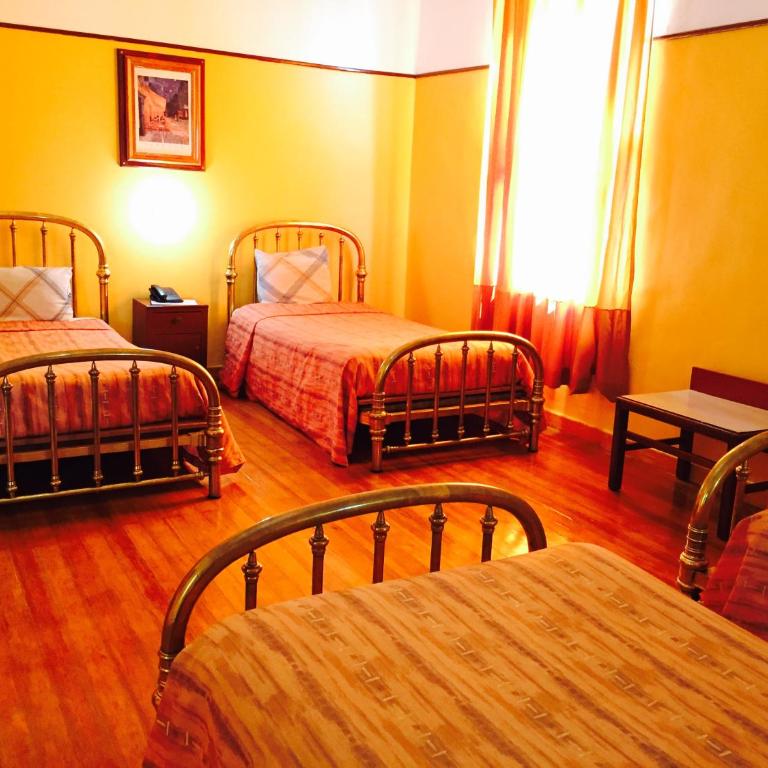 Hotel Isabel - Habitación Cuádruple Clásica - 15