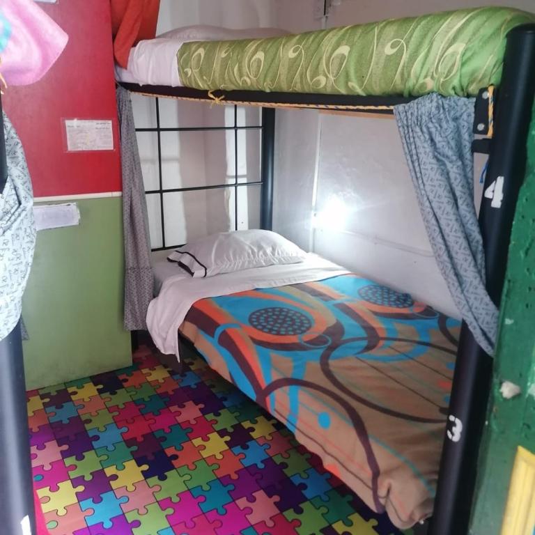 Hostal Gastro Bar Casa Colibrí - Cama en habitación compartida con 4 camas - 3