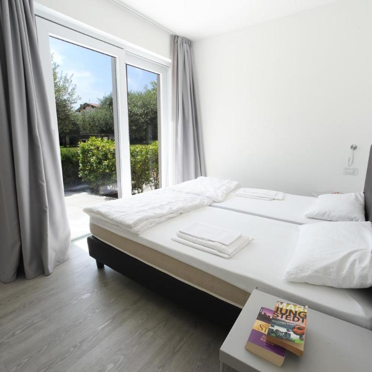 Residence Goethe - Appartamento con 2 Camere da Letto con Accesso Diretto al Giardino - 8