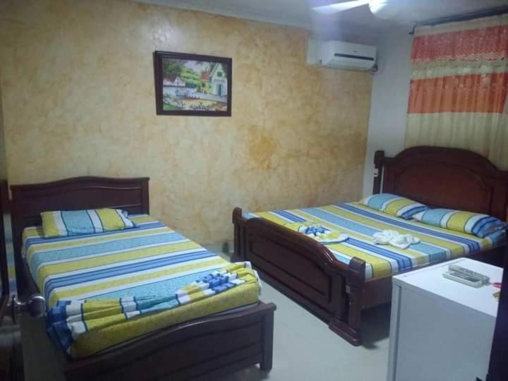 Hotel Colonial Inn - Habitación Doble - 2 camas dobles - 17