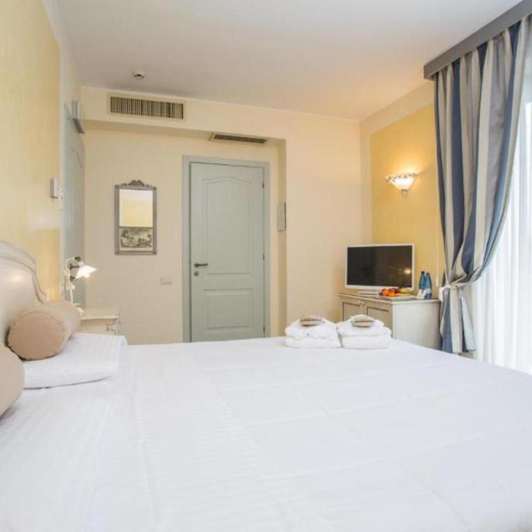 Hotel Spiaggia d'Oro - Charme & Boutique by Double Hospitality - Camera Standard Matrimoniale/Doppia con Letti Singoli - 1