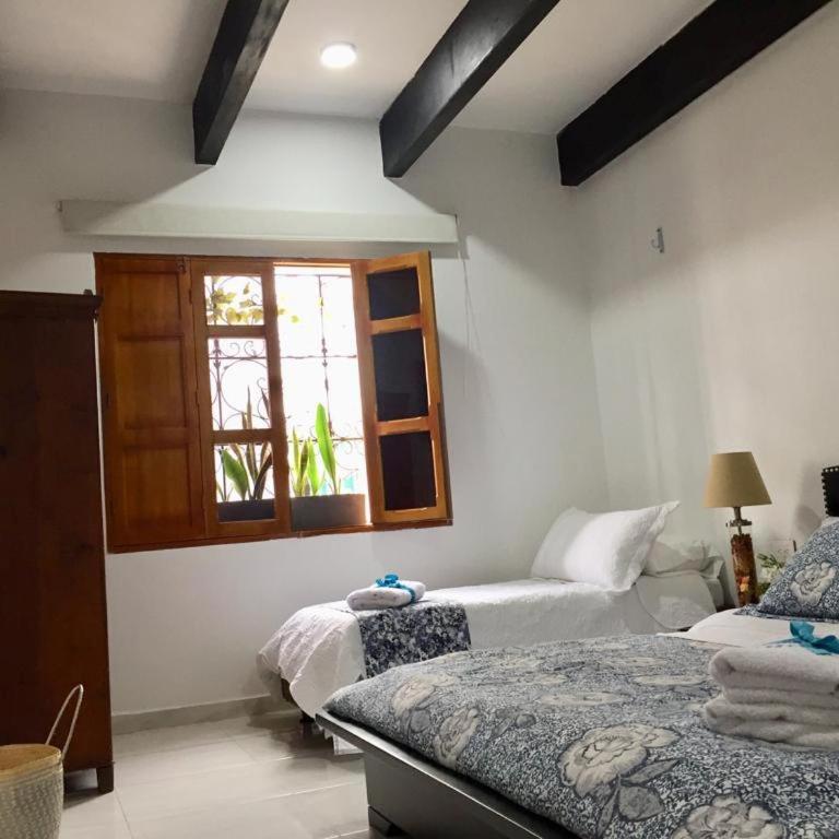 Luna Nueva Casa de Huéspedes - Deluxe Triple Room - 1