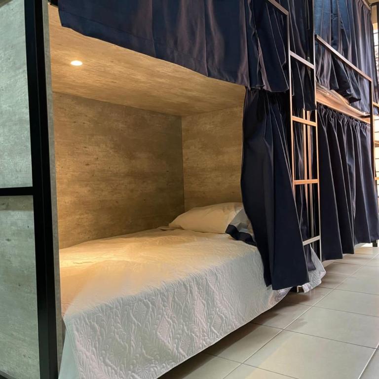 HOSTAL XAO - Cama en habitación compartida con 4 camas - 2