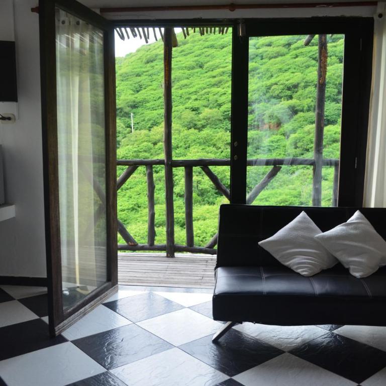 Akela Gaira Hotel - Habitación Cuádruple con balcón - 1