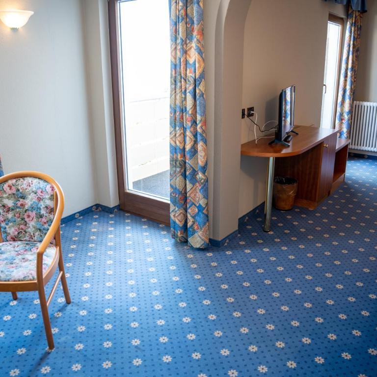 PanoramaHotel Penegal - Deluxe Doppelzimmer mit Zustellbett - 9