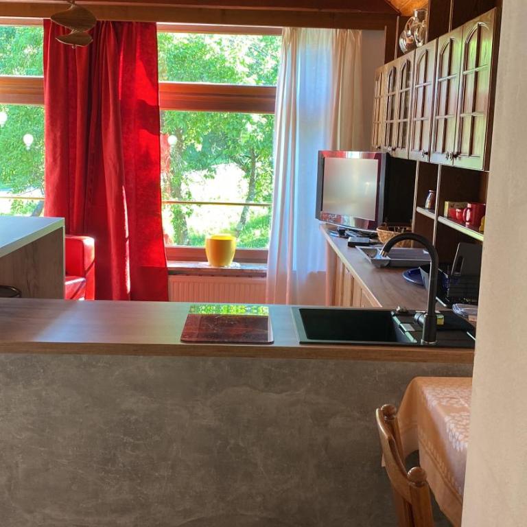 Landhaus GRETE Ferienwohnungen - Apartment mit Gartenblick - 13