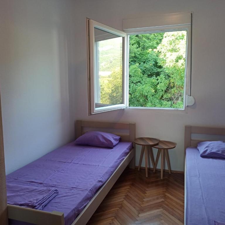 Two-bedroom apartment with parking and sea view - Two-Bedroom Apartment with Balcony and Sea View - 18
