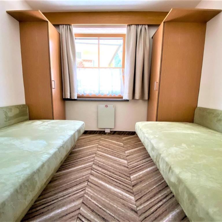 Pension Appartements Gabriele - Apartment mit 2 Schlafzimmern und Balkon - 9