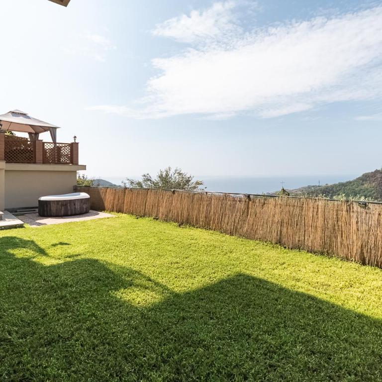 La Roccia Fiorita Appartamento con giardino e Jacuzzi - Casa con 1 Camera da Letto - 22
